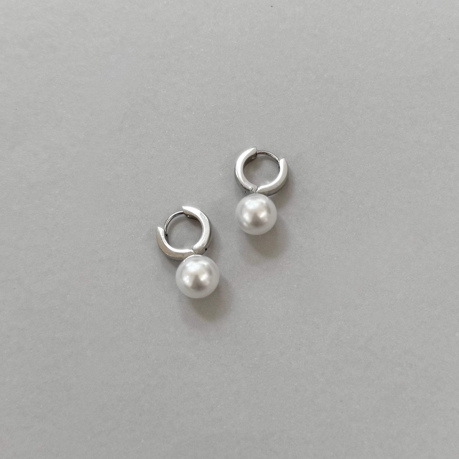 CASEY SILVER PEARL HUGGIE EARRINGS